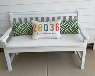 White wood chippy bench. Cracking paint. Comes with 3 pillows. W - 47. D- 22. H- 32 1/2. Price - $38.00