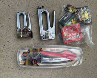 Two staple guns and Corona pruning saw and staples. Price $20.00
