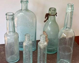 393 antiqueembossedaquaglassbottles