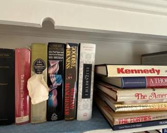 265 assortedhardcoverandsoftcoverbooks