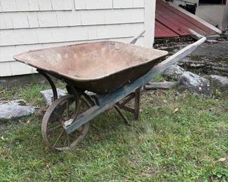 544 antiquemetalwheelbarrowwithwoodenha
