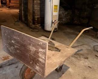 508 vintagewoodenwheelbarrowwithmetalfr