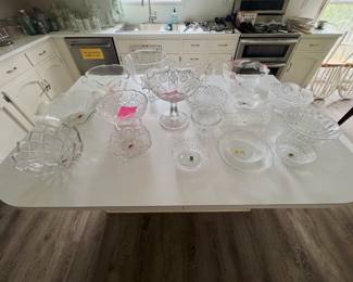 clear pressed and cut glass bowls: L.E. Smith pedestal bowl, footed compote, trifle bowl, ruffled bowls, pink calla lily bowl, relish dish, and serving bowls