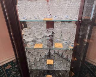 Fostoria American stemware: footed iced tea goblets, footed sherbet/champagne glasses, footed water goblets, footed juice/cocktail glasses; Whitehall highball goblets