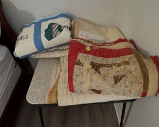 late nineteenth-century to early twentieth-century antique quilts (outstanding collection of authentic handmade antique quilts featuring multicolored geometric diamonds, traditional block patterns, appliqué work, and traditional patchwork)