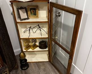 Antique display cabinet, art, brass bookends