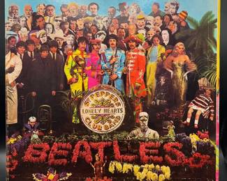 The Beatles “Sgt. Pepper’s Lonely Hearts Club Band” Vinyl Record Album