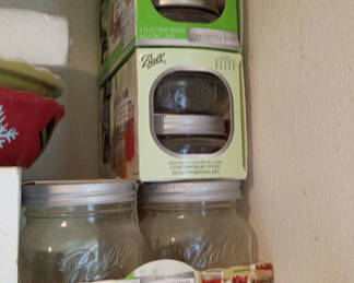 Lot 165: Assorted Glass Jars, Bottles, and Kitchen Storage Items
