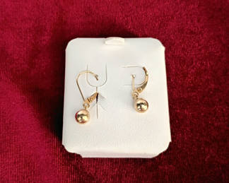 Lot 117: 14K Gold Concave Hoop Earrings