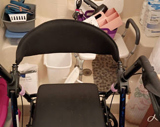 Lot 153: Rolling Walker With Seat and Bathroom Care Items