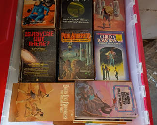 Lot 113: Collection of Science Fiction Paperback Books in Plastic Storage Bin