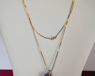 Lot 171: Gold 14k Necklace with Two Decorative Egg Charms