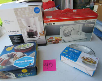 Lot 128: Coffee Maker, Electric Food Slicer, Bundt Pan, and Pie Plates