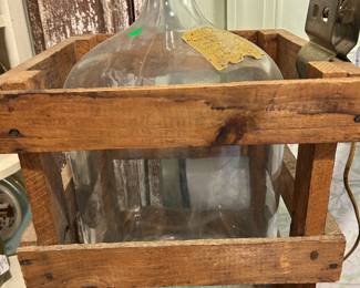 Antique 5 gallon bottle and crate