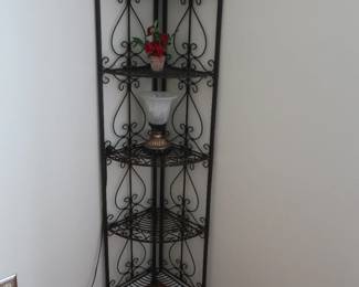 bakers rack or plant stand with decor