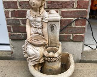 Girl at a Well fountain made of authentic stone or heavy cast concrete