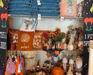 Patio chair, cushions, children’s holiday clothing, gnomes Halloween decorations