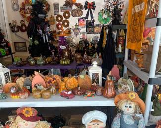Decorative lanterns, scarecrows, pumpkins, pilgrims cornucopias