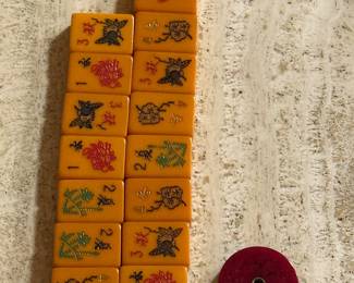 Mahjong tiles and bettor's wheel