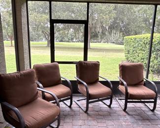Set a four outdoor chairs with Sunbrella cushions
