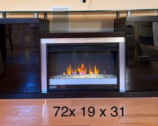 Smoke glass entertainment cabinet with fireplace