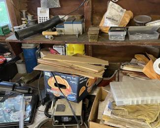 Workbench Shelving Contents with Schumacher Battery Charger – Unsearched