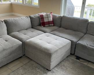 Multi-Piece Tufted Fabric Sectional Sofa with Ottoman