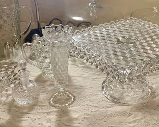 American Fostoria including a square cake pedestal with rum well, torte plate, vase, pitcher, cruet, and small pitchert