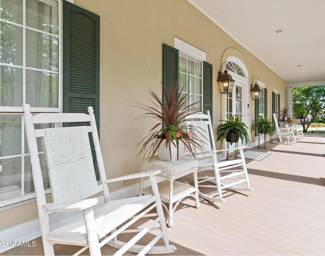 front porch furniture and plants