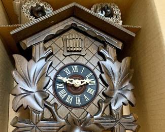 we have two brand new in box German cuckoo clocks