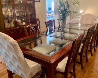 gorgeous Chinese Chippendale style dining table with 6 side chairs and two upholstered captain chairs