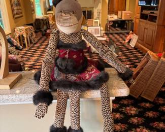 What is a "Leopard print monkey in a mink lined dress" Alec