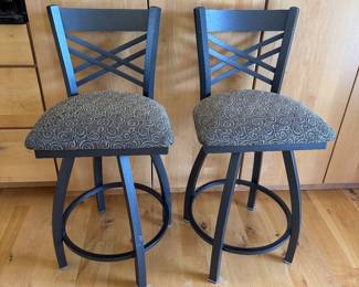 Four swivel metal counter height bar stools