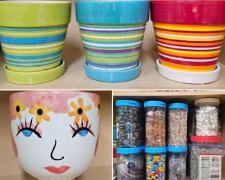 bright and happy plant pots with tubs of rocks