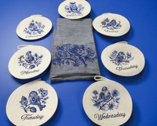 Days-of-the-Week Blue & White Embroidered Trivets + Towel β 8 Pc