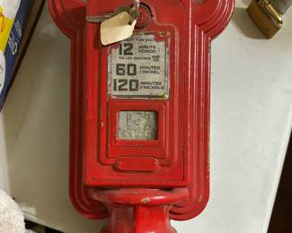 Antique nickel and penny parking meter with keys