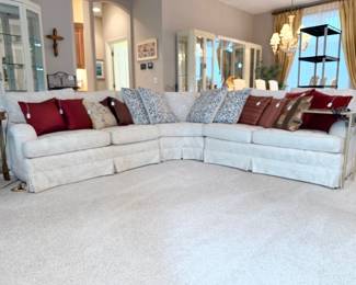 Large white multi-piece living room sectional sofa, multiple options of accent pillows