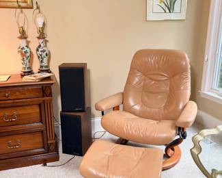 Ekornes Stressless tan leather swivel recliner with matching ottoman