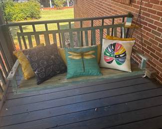 Porch swing and pillows