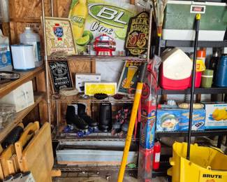 ...bar items, coolers, thermoses, skates, mop and bucket, car jack, kite...