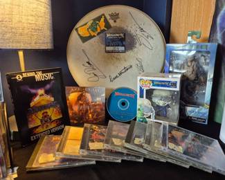 Megadeth signed drum skin from 2001 Hero tour. Added the Iron Maiden since they were in concert together in Tinley last week.