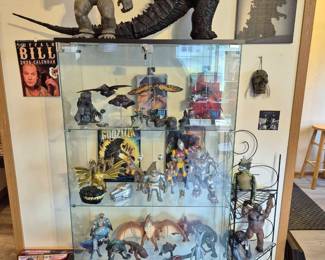 Oh look! More Godzilla and King Kong! This glass display cabinet has lights and locks. (Key will be at checkout.)