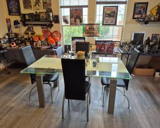 Great expandable glass table as we enter the large dining area of the home. (which happens to be for sale.)