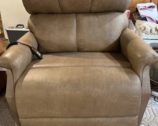 Only six months old this leather recliner lifts you right out of the chair