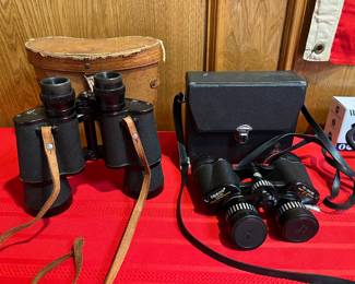 Two pairs of great binoculars with their cases