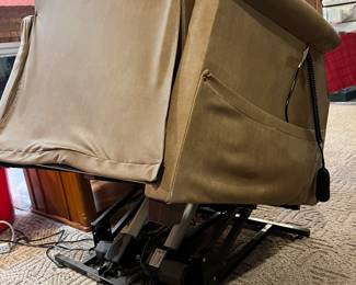 This shows how the chair lifts up so that it tilts forward so you can walk out of the chair