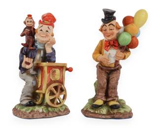 A Pair of Hand-Painted Glazed Ceramic Clown Figurines