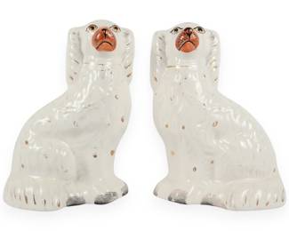 A Pair of Ceramic Seated Spaniel Figurines