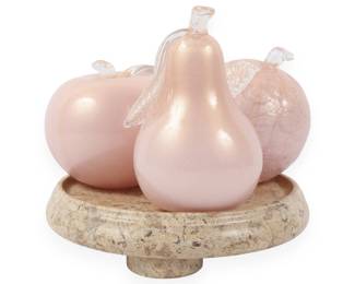 A Group of Art Glass Fruit and a Fossiliferous Stone Pedestal Stand