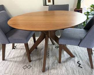 MCM-style round dining table with 4 chairs